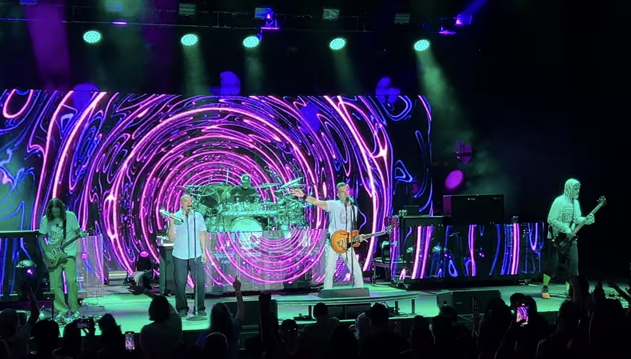 311 — Members of 311 performing on stage